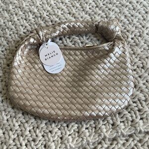 Brand new clutch by Melie Bianco